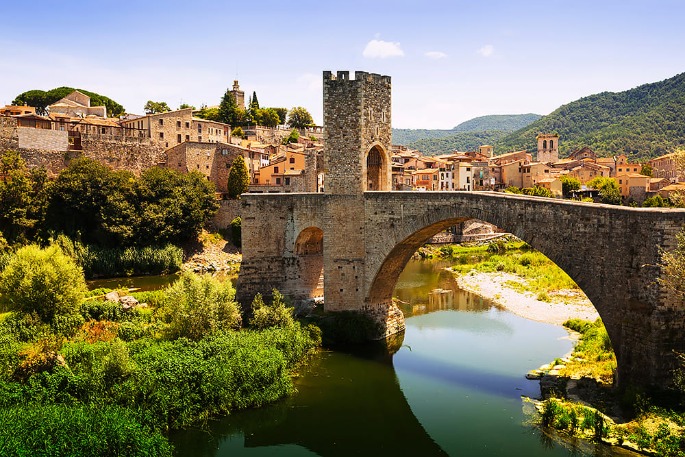 Cities in La Garrotxa span a region comprising protected lands, urban areas and industry